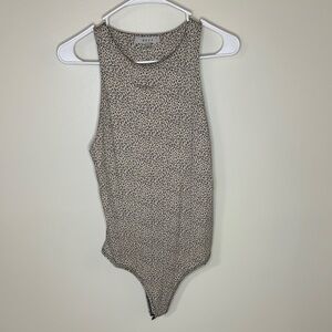Tan leopard print women’s tank body suit